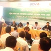 Hội thảo “Vận hành thị trường chứng khoán phái sinh Việt Nam” (Ảnh: PV/Vietnam+)