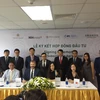 Lễ ký Hợp đồng huy động 400 tỷ đồng giữa PAN Farm và các nhà đầu tư trong nước và quốc tế. (Ảnh: PV/Vietnam+)