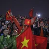 "Nóng ấm tình yêu" của người hâm mộ với đội tuyển U23. (Ảnh: Minh Sơn/Vietnam+)
