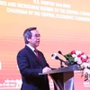 Đồng chí Nguyễn Văn Bình, Trưởng Ban Kinh tế Trung ương phát biểu tại Hội thảo chuyên đề "Chủ động ứng phó với biến đổi khí hậu và củng cố an ninh năng lượng đảm bảo phát triển bền vững, ngày 17/1. (Ảnh: Vietnam+)