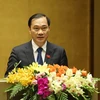 Chủ nhiệm Ủy ban Kinh tế của Quốc hội Vũ Hồng Thanh trình bày Báo cáo tại phiên họp sáng 20/5.