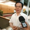 Đại biểu quốc hội Hoàng Văn Cường, đoàn Hà Nội trả lời phỏng ván báo chí. (Ảnh: PV/Vietnam+)