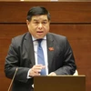 Bộ trưởng Bộ Kế hoạch và Đầu tư, Nguyễn Chí Dũng trình bày báo cáo giải trình, làm rõ một số vấn đề đại biểu quốc hội nêu ra tại hội trường, ngày 31/5.