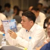 Ngày 28/6, HoSE chính thức đưa sản phẩm chứng quyền có bảo đảm lên giao dịch trên thị trường niêm yết. (Ảnh: PV/Vietnam+)