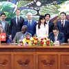 Ký kết Hiệp định viện trợ không hoàn lại cho Dự án “Hỗ trợ kỹ thuật cho dự án Phát triển giao thông xanh thành phố Hồ Chí Minh,” ngày 15/1. (BTC/VietnamPlus+)