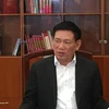 Bộ trưởng Bộ Tài chính - Hồ Đức Phớc trả lời phỏng vấn báo chí. (Ảnh: Vietnam+)