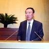 Tổng Thanh tra Chính phủ Đoàn Hồng Phong trình bày Báo cáo về công tác phòng, chống tham nhũng năm 2022. (Ảnh: Phạm Kiên/TTXVN)