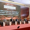 Phiên thảo luận tại hội thảo “Cộng hưởng sức mạnh đầu tư vì một Việt Nam thịnh vượng,” do Báo Đầu tư (Bộ Kế hoạch và Đầu tư) tổ chức ngày 15/5. (Ảnh" PV/Vietnam+)