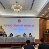Bộ trưởng, Chủ nhiệm Văn phòng Chính phủ Trần Văn Sơn chủ trì họp báo Chính phủ thường kỳ tháng 11/2023, ngày 6/12. (Ảnh: Vietnam+)