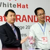 Ông Nguyễn Huy Dũng (trái) và ông Ngô Tuấn Anh khai mạc cuộc thi WhiteHat Grand Prix - Global Challenge 2015. (Ảnh: Trung Hiền/Vietnam+)