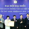 Công đoàn TTXVN nhận Huân chương Lao động hạng Nhất (Ảnh: Minh Chiến/Vietnam+)