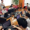 Một đội hỗ trợ kỹ thuật trong buổi diễn tập chống mã độc mã hóa tống tiền của Bkav. (Ảnh minh họa: Vietnam+)