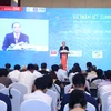 Thủ tướng Chính phủ Nguyễn Xuân Phúc tham dự và có bài phát biểu quan trọng tại ICT Summit 2018. (Ảnh: Minh Quyết/Vietnam+)