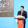 Ông Trương Gia Bình, Chủ tịch VINASA phát biểu tại sự kiện. (Ảnh: Minh Quyết/Vietnam+)