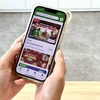 Ứng dụng GoFood của Gojek đã giúp rất nhiều chủ quán ăn tiếp cận gần hơn với người tiêu dùng. (Ảnh: V.C/Vietnam+)