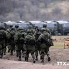 Binh sỹ Nga trở về căn cứ sau cuộc tập trận gần biên giới Ukraine