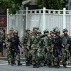 Cảnh sát bán quân sự Trung Quốc tuần tra tại Urumqi. Ảnh minh họa. (Nguồn: AFP/TTXVN)