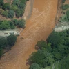 Cảnh ngập lụt tại Izabal, Guatemala ngày 6/8. (Nguồn: THX/TTXVN)