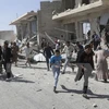 Cảnh đổ nát do xung đột tại làng Kafruma, tỉnh Idlib, Syria ngày 24/9. (Nguồn: Reuters/TTXVN)