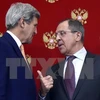 Ngoại trưởng Nga Sergei Lavrov và người đồng cấp Mỹ John Kerry. (Nguồn: AFP/TTXVN)