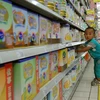 Lượng dự trữ sữa bột khổng lồ của Trung Quốc đã khiến giá sữa sụt giảm mạnh. (Nguồn: AFP/TTXVN)