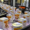 Dây chuyền đang sản xuất sản phẩm sữa đặc phục vụ xuất khẩu tại nhà máy sữa của Vinamilk.