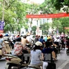 Biểu ngữ tuyên truyền không hút thuốc lá trên đường phố Hà Nội (Nguồn: TTXVN)