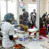 Người bệnh chờ làm xét nghiệm tại Bệnh viện Nội tiết Trung ương. (Ảnh: TTXVN/Vietnam+)