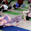Tập Yoga không đúng cách dễ dẫn tới chấn thương. (Ảnh: Doãn Đức/Vietnam+)