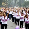 Học sinh, sinh viên nhảy Flashmob hưởng ứng lễ phát động Tháng hành động vì bình đẳng giới. (Ảnh: TTXVN/Vietnam+)