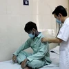 Bệnh nhân mắc bệnh thủy đậu đang được điều trị tại Bệnh viện E. (Ảnh: PV/Vietnam+)