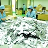 Đóng gói thuốc thành phẩm tại một công ty dược. (Ảnh: TTXVN/Vietnam+)