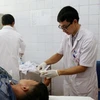 Một bác sỹ trẻ về công tác tại Bệnh viện Đa khoa huyện Bắc Hà. (Ảnh: T.G/Vietnam+)