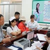 Bệnh nhân khám dịch vụ tại bệnh viện Quận 2, Thành phố Hồ Chí Minh. (Ảnh: Phương Vy/TTXVN)