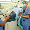 Phẫu thuật Robot tại Bệnh viện Bạch Mai. (Ảnh: Dương Ngọc/TTXVN)