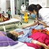 Người bệnh được thụ hưởng dịch vụ y tế chất lượng cao ngay tại bệnh viện tuyến huyện. (Ảnh: Dương Ngọc/TTXVN)