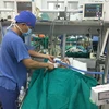 Chăm sóc cho bệnh nhân tại Bệnh viện Việt Đức. (Ảnh: PV/Vietnam+)
