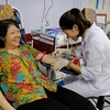 Người dân đến hiến máu tại Viện huyết học-Truyền máu Trung ương. (Ảnh: PV/Vietnam+)