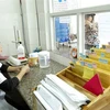 Theo dõi, quản lý bệnh nhân tại Trung tâm phòng chống HIV/AIDS tỉnh Bình Định. (Ảnh: TTXVN/Vietnam+)