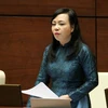 Bộ trưởng Bộ Y tế Nguyễn Thị Kim Tiến giải trình ý kiến trong phiên họp Quốc hội sáng 16/11. (Ảnh: TTXVN)