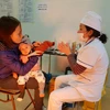 Tiêm vắcxin là cách phòng bệnh sởi tốt nhất cho trẻ hiện nay. (Ảnh: T.G/Vietnam+)