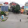 Đường phố Hà Nội vắng lặng trong những ngày giãn cách xã hội. (Ảnh: Thanh Tùng/TTXVN)