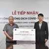 LG Việt Nam tặng Bộ Y tế gói trang thiết bị y tế. (Ảnh: PV/Vietnam+)