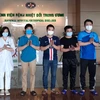 Bệnh nhân mắc COVID-19 được Bệnh viện Bệnh nhiệt đới Trung ương công bố khỏi bệnh ngày 2/6. (Ảnh: PV/Vietnam+)