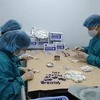 Nghiên cứu sản xuất vắcxin COVID-19 tại VABIOTECH. (Ảnh: PV/Vietnam+)