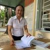 Chị Trần Thị Sen tận tuỵ với công việc hỗ trợ những người có HIV đi điều trị. (Ảnh: Thùy Giang/Vietnam+)