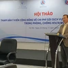 Tiến sỹ Hoàng Đình Cảnh, Phó Cục trưởng Cục Phòng, chống HIV/AIDS phát biểu tại hội thảo. (Ảnh: PV/Vietnam+)