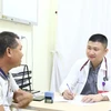 Bệnh nhân khám bệnh lý suy giãn tĩnh mạch. (Ảnh: PV/Vietnam+)