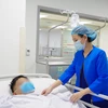 Bệnh nhân đang điều trị tại Bệnh viện Trung ương Quân đội 108. (Ảnh: PV/Vietnam+)
