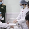 Các khâu chuẩn bị để tiêm thử vắcxin Nano Covax. (Ảnh: Hiếu Hoàng/Vietnam+)
